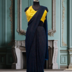 Blue Premium Lycra Saree with golden sequin blouse.